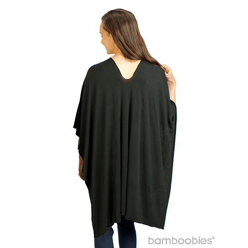 Back of woman wearing black open nursing cover