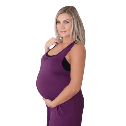 Side of pregnant woman wearing purple nursing nightgown
