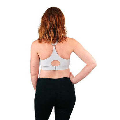 Back of woman wearing gray racerback nursing bra
